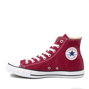Maroon high top converse.